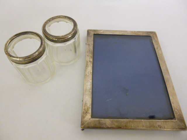Silver photograph frame, hallmarked London 1907, missing easel stand, 16.5x12.25cms, together with
