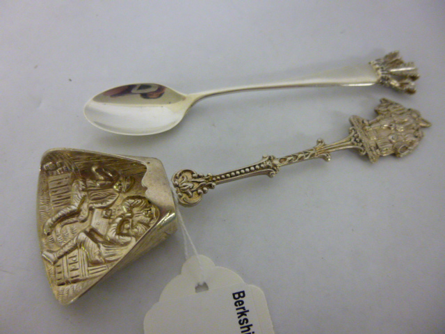 Dutch silver spoon embossed with figures, stamped with the key mark, together with a silver