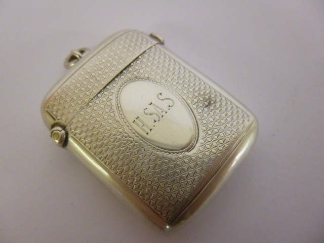 Silver vesta case with engine turned decoration, hallmarked Birmingham 1927