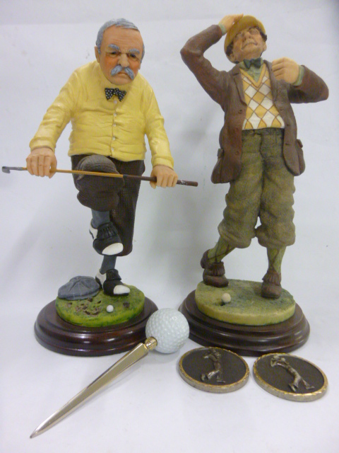 Golf - Two D. Fairweather Golfing figures on wooden plinths together with a Golf ball letter opener,