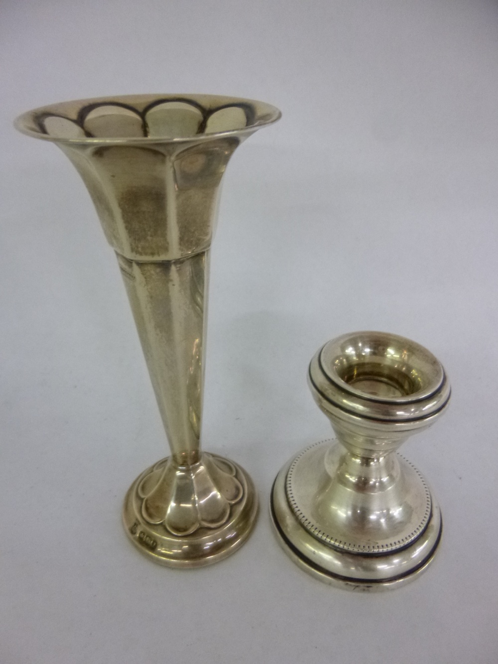 Silver hallmarked 1917 posy vase together with a silver hallmarked candlestick