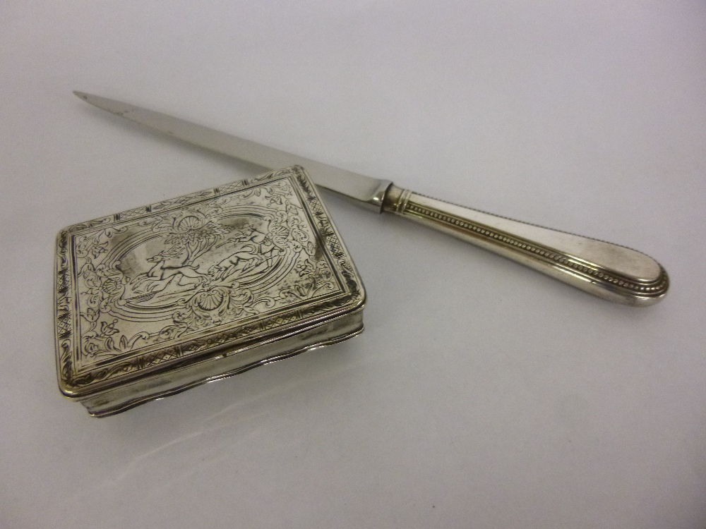 Silver plated, gilt lined snuff box with engraved hunting scene together with a letter opener