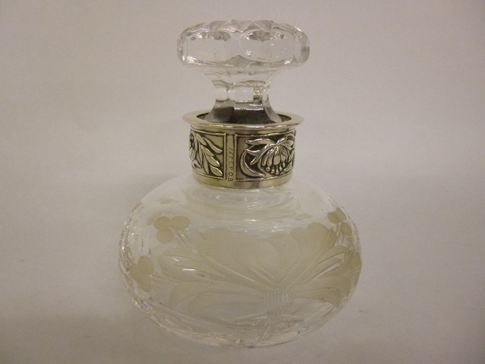 Royal Brierley silver plated collared scent bottle, the glass etched with a floral design and the