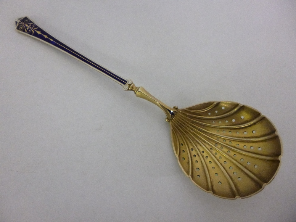 Norwegian silver gilt sifter spoon with enamelled handle, 16cms in length, 33.7g