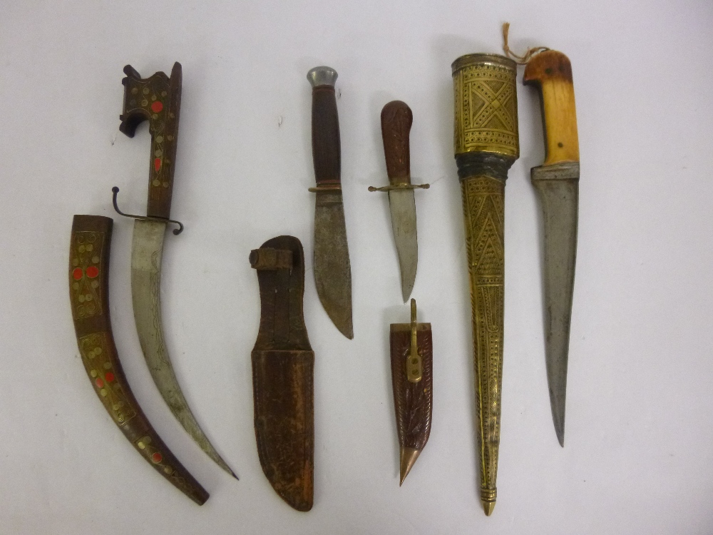 19thC dagger with bone handle in brass sheath, together with one other dagger with curved blade in a