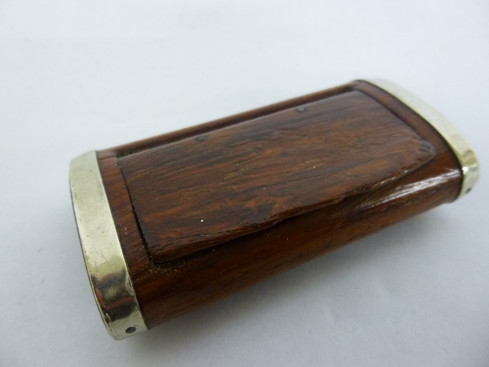 A wooden snuff box with plated strapping to ends