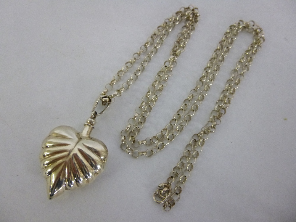 Silver heart shaped scent bottle on 29" silver chain