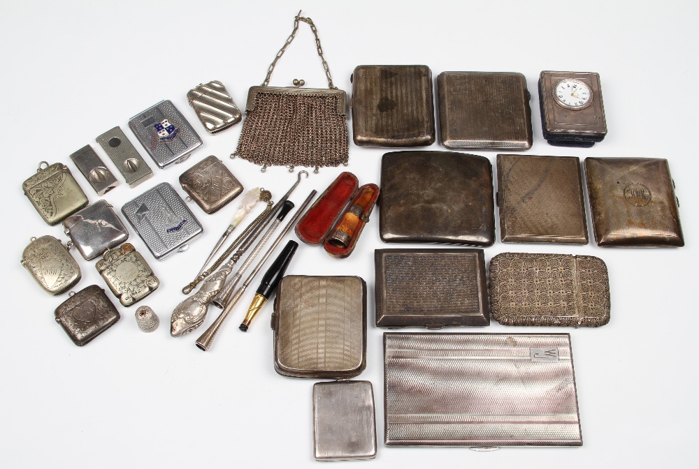 A parcel lot of silver and metalware to include eight cigarette cases, most with engine turned