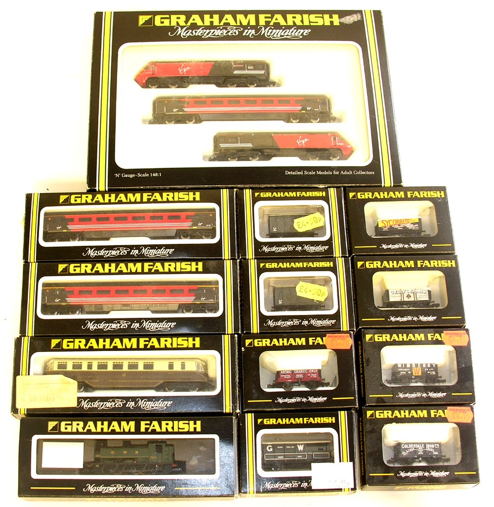 A collection of boxed Graham Farish `N` gauge items to include 0-6-0 GWR Pannier Tank locomotive