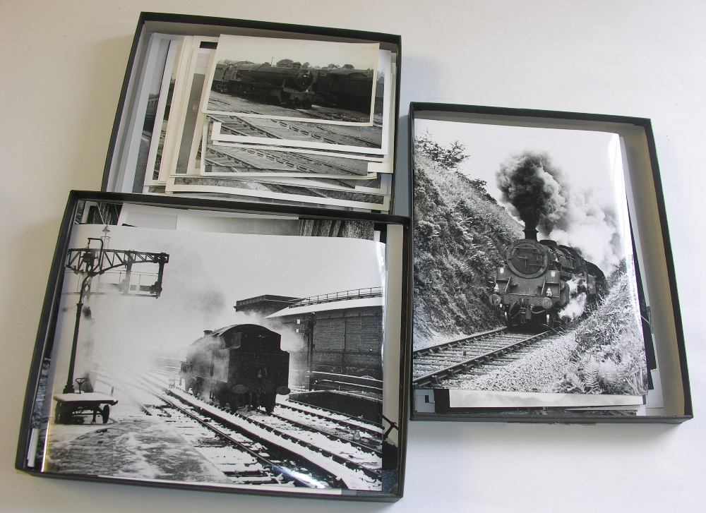 Three boxes containing a large collection of various British Railways locomotives, rolling stock