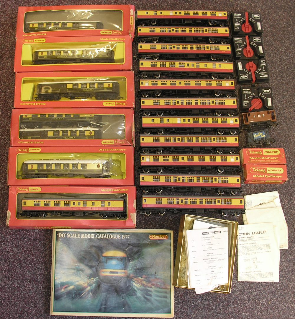 A large quantity of boxed and loose Hornby and other `00` gauge items, to include carriages, rolling
