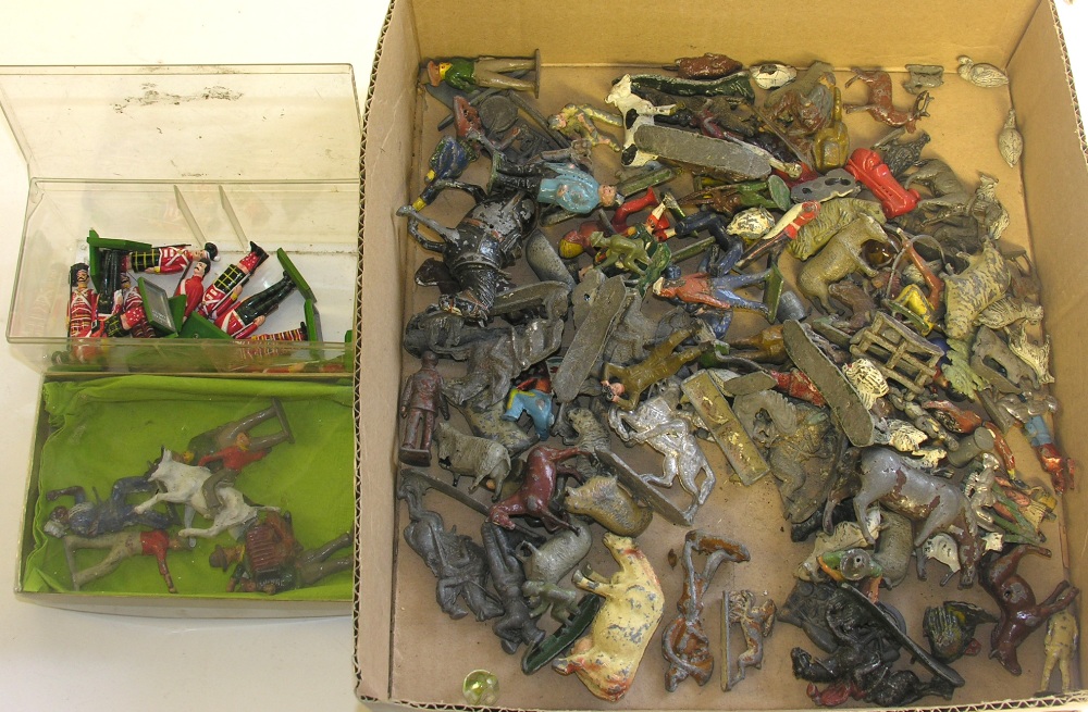 A large collection of various metal figures by Britains and others.