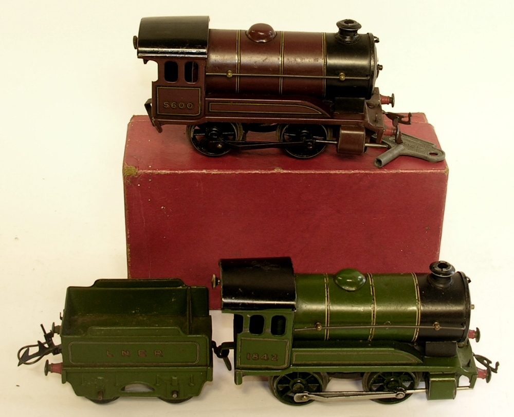 A boxed Hornby Trains `0` gauge tin plate clockwork 0-4-0 locomotive 5600, a LNER 0-4-0 locomotive