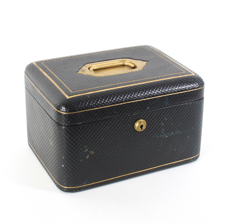 A Victorian black leather cross-hatched jewellery box of rectangular form, with gilt tooled line