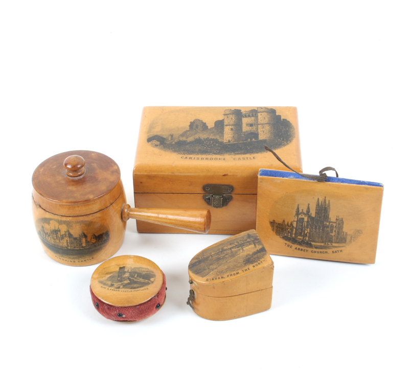 Five pieces of Mauchline ware, comprising; a slant top thimble box (Girvan From The North) with