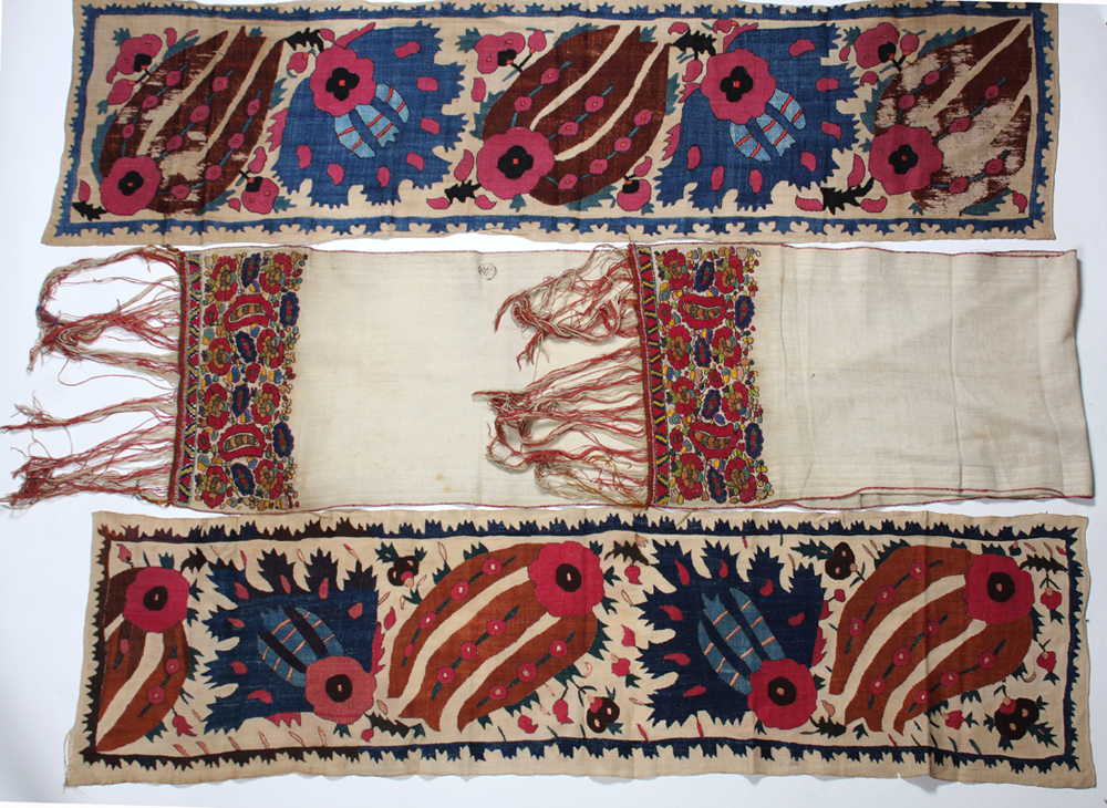 A group of seven embroidered ‘World’ textiles, including; two susani panels, an embroidered