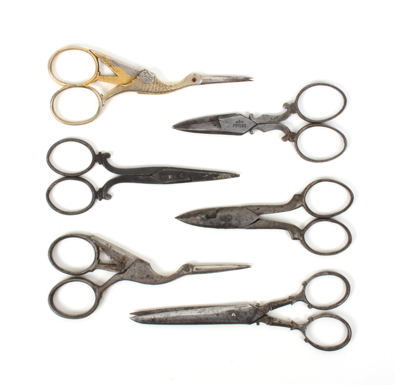 Six pairs of 19th century steel scissors, including two pairs in the form of storks, a pair of