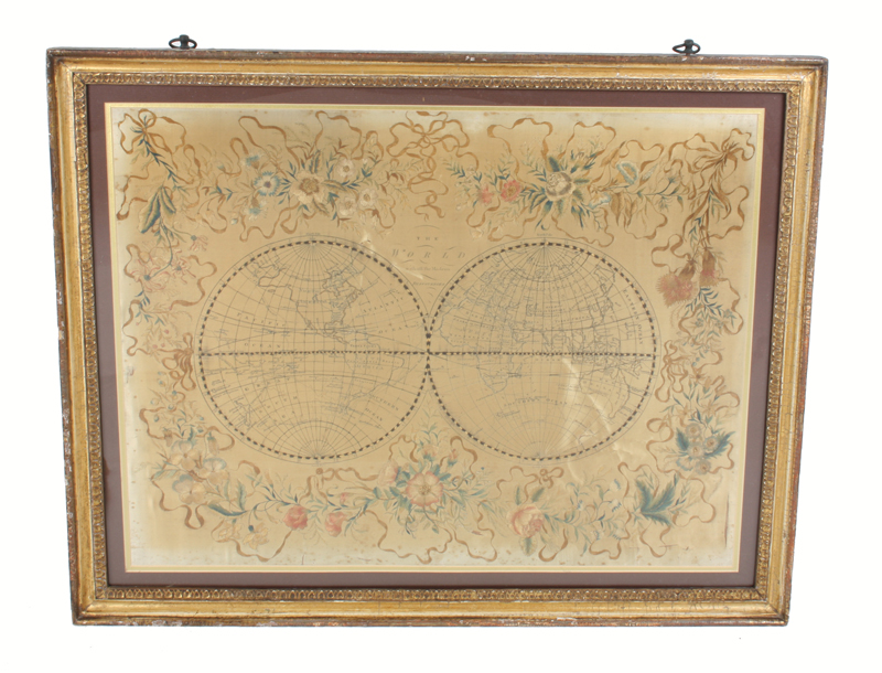 A late 18th century silk embroidered map of the world, depicting two faces of the globe and