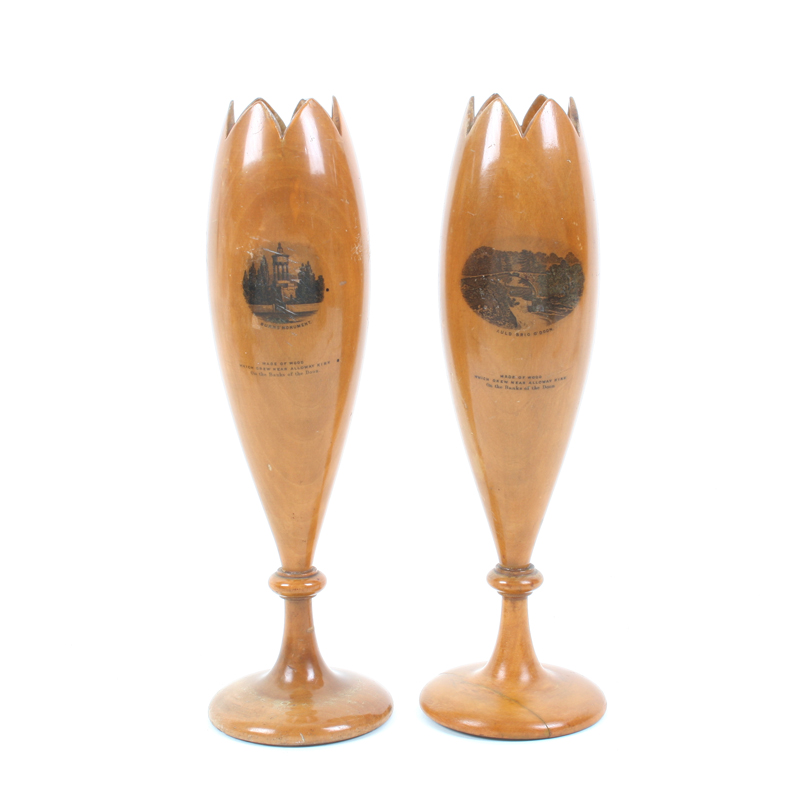 A large pair of Mauchline ware spill vases, with circular pedestal bases and cut rims (Burn’s