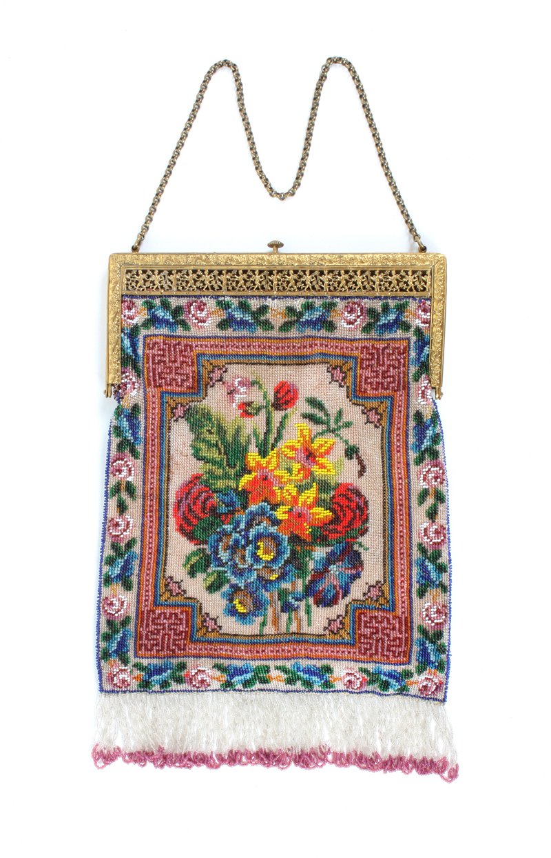 A fine beadwork lady’s rectangular evening bag, worked to both sides with a panel of a bouquet of