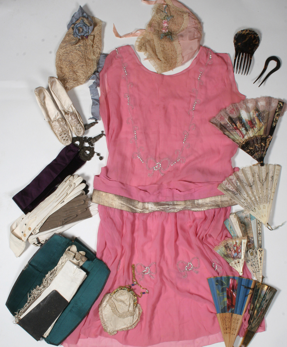A group of lady’s dress and accessories, late 19th/early 20th century, including a 1920s pink