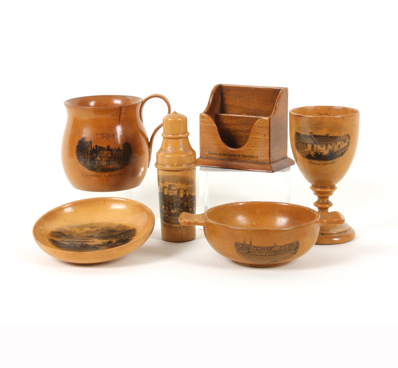 Six pieces of Mauchline ware, comprising: A quaiche (Inverness), 10cm, an egg cup (Burns Cottage -