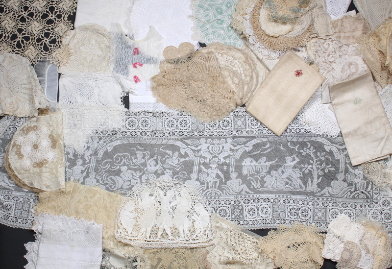 A large collection of linen, mostly openwork, cloths, runners, mats, doilies, etc. (qty)