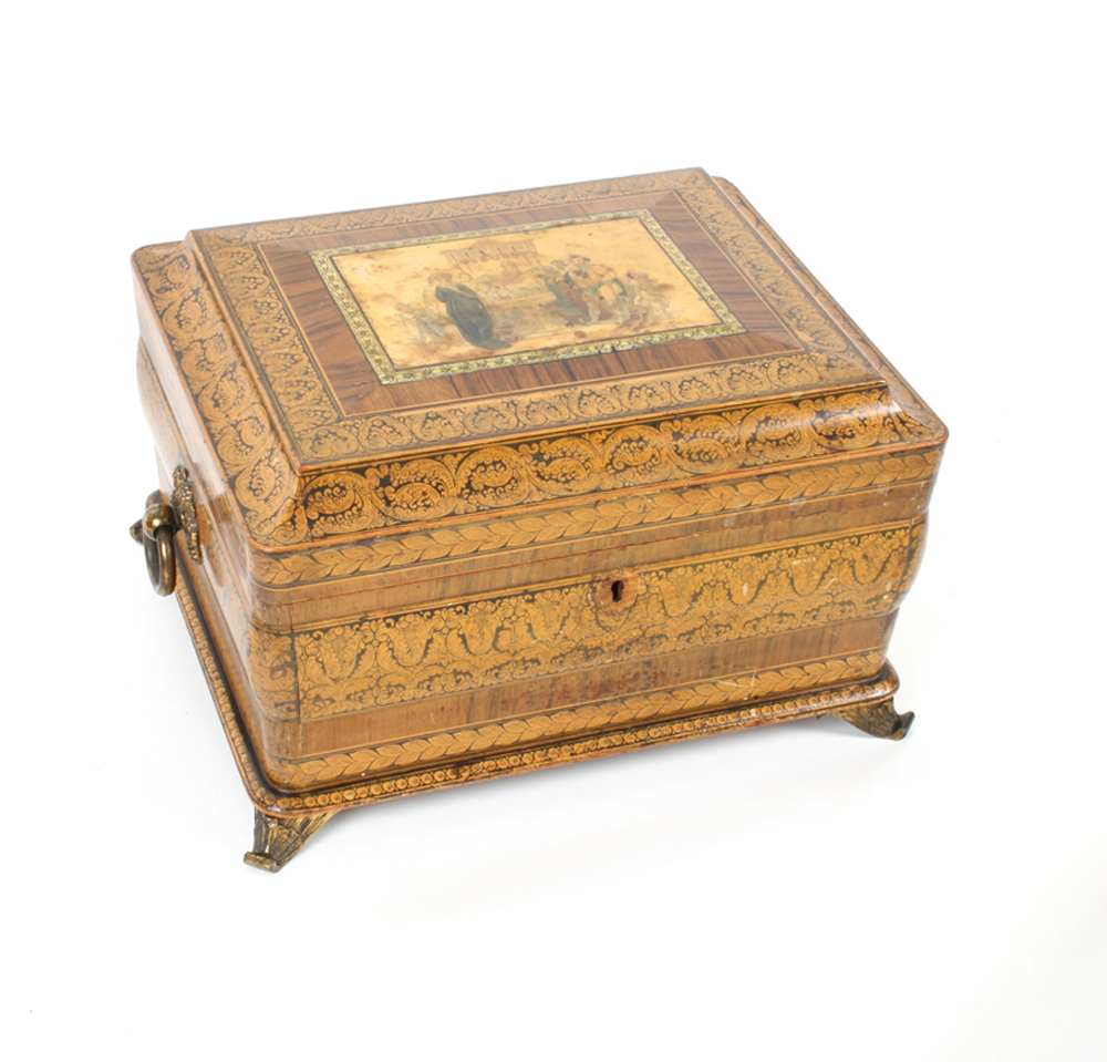 A fine Regency rosewood and penwork sewing box of rectangular form, the stepped lid with a central