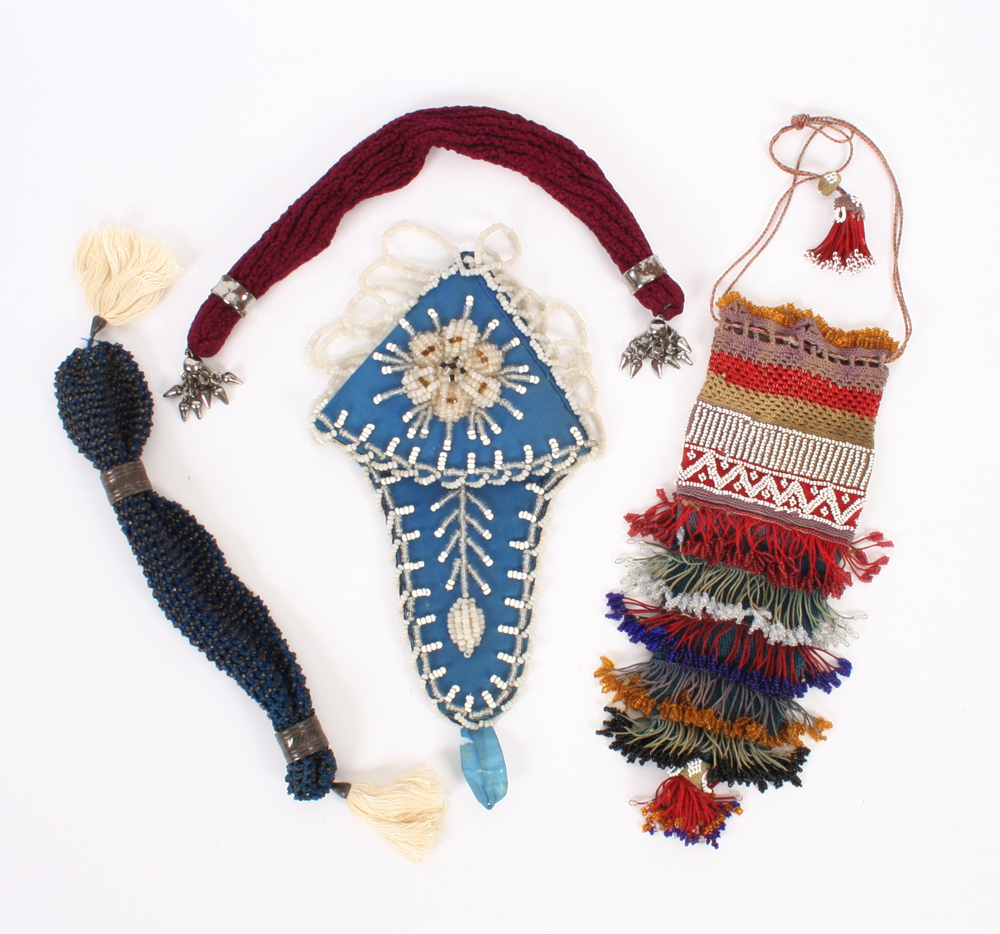 Purses & Beadwork: Two knitted and steel mounted miser’s purses, an elaborate knitted beadwork purse