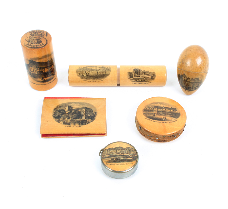 Six pieces of Mauchline ware: A crochet cylinder (Hastings from the Sea/Hastings Castle), with