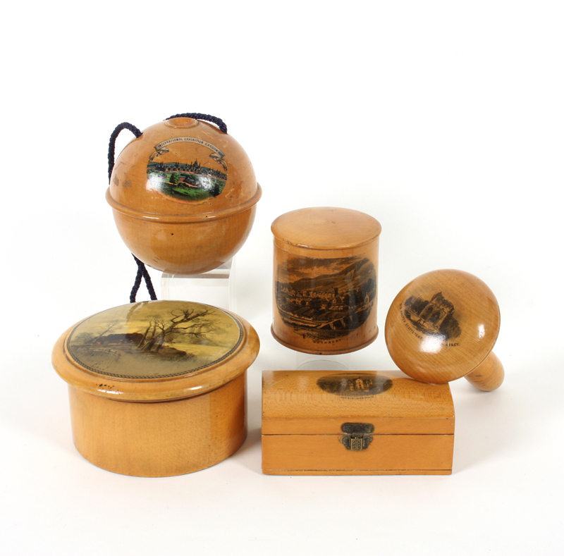 Five pieces of Mauchline ware, comprising: A circular reel box, internal end reel label for