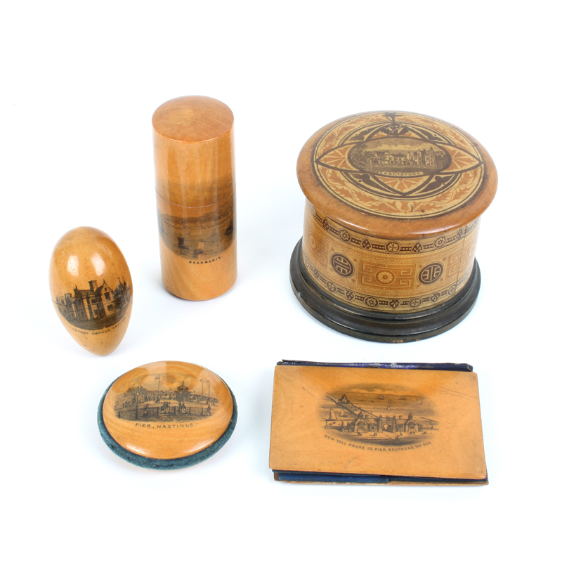 Five pieces of Mauchline ware: A cylinder cotton box (Abbotsford - pattern ware), 8cm diameter, a