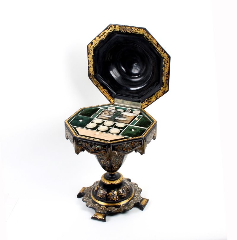 Victorian papier-mache sewing box in the form of a scaled down work table, the octagonal top with