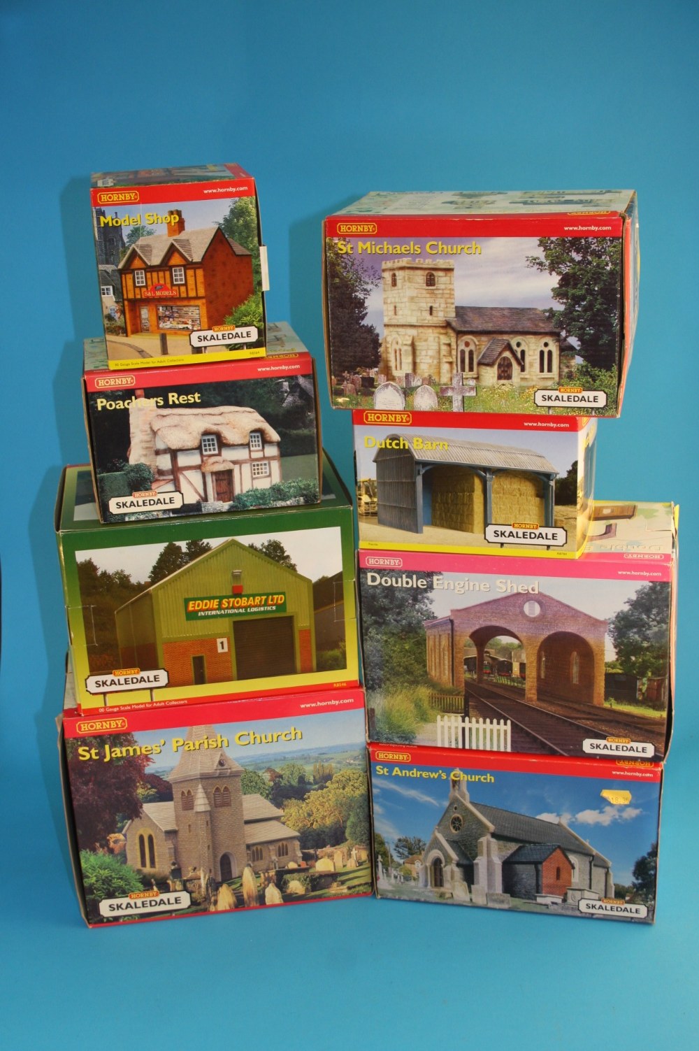 A fifty piece Hornby `00` gauge `Skaledale` Village to include; St. James`s church, Station House,