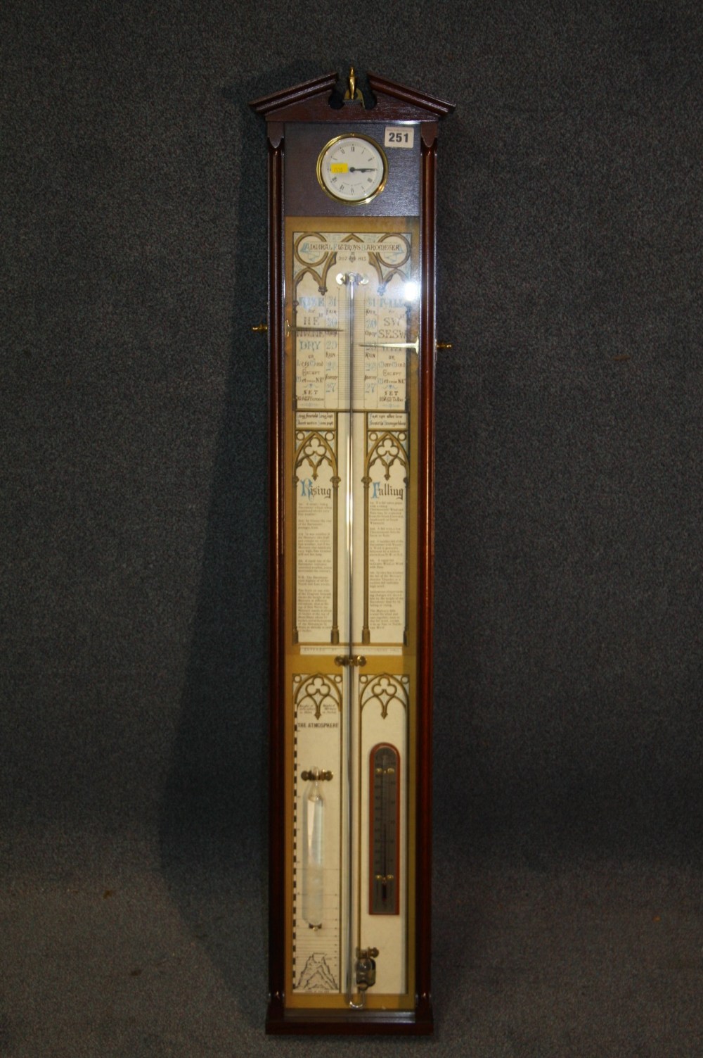 A modern Comitti of London Admiral Fitzroy Barometer, in mahogany case. 110cm long