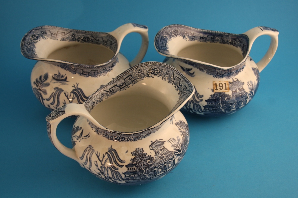 A set of 3 blue and white cetem ware Maling "Willow" pattern water jugs, blue printed mark.