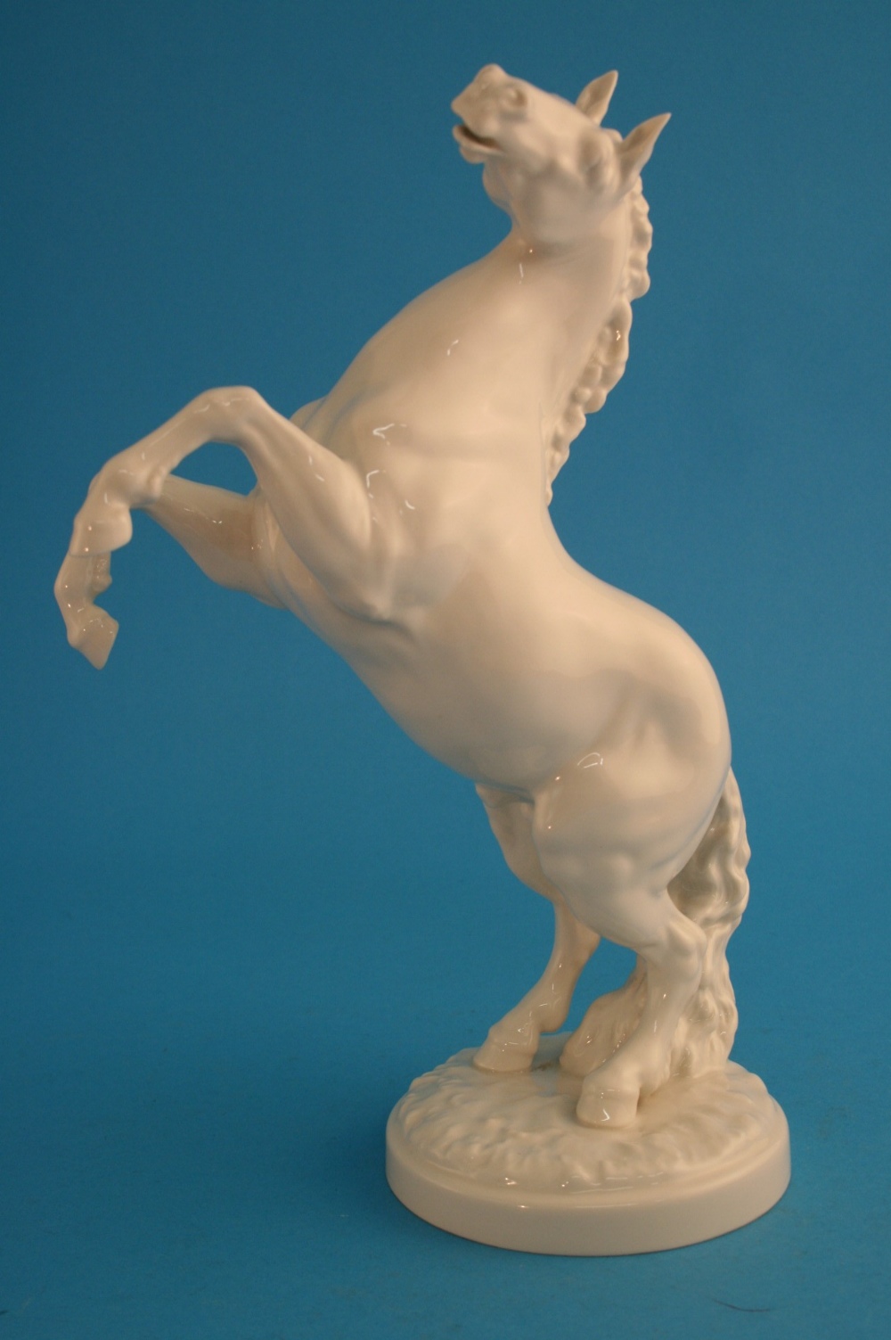 A Kunstabteilung German porcelain rearing white horse, printed marks. 31 cm high
