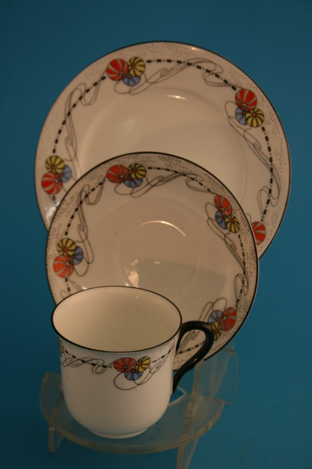 A Shelley "Balls of Yarn with Strings" pattern tea service comprising 6 cups, 6 saucers and 6 side