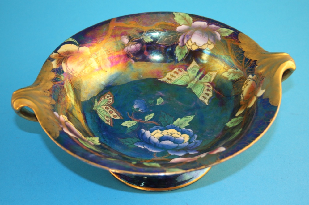 A Maling two handled pedestal bowl decorated with butterflies and colourful flowers, printed mark