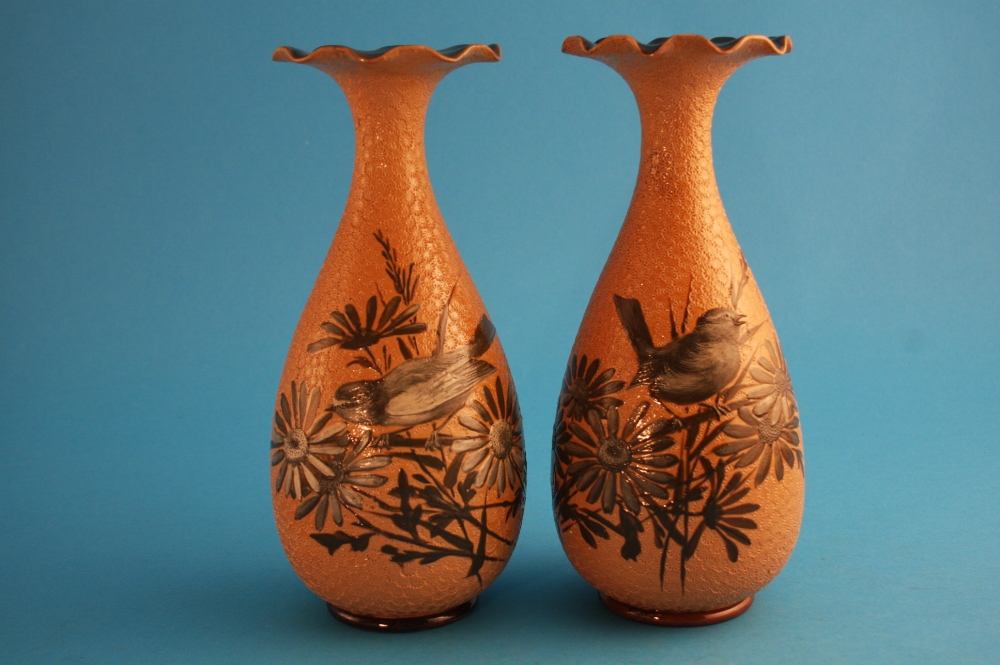 A pair of Doulton Lambeth stoneware vases by Florence Barlow with crimped flared rims, the bottle