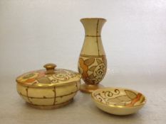 A Charlotte Rhead (Bursleyware) trio, powder bowl, vase and pin dish