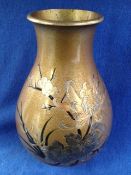 Japanese bronze baluster form vase inlaid on a gold laquer ground with the three friends of winter