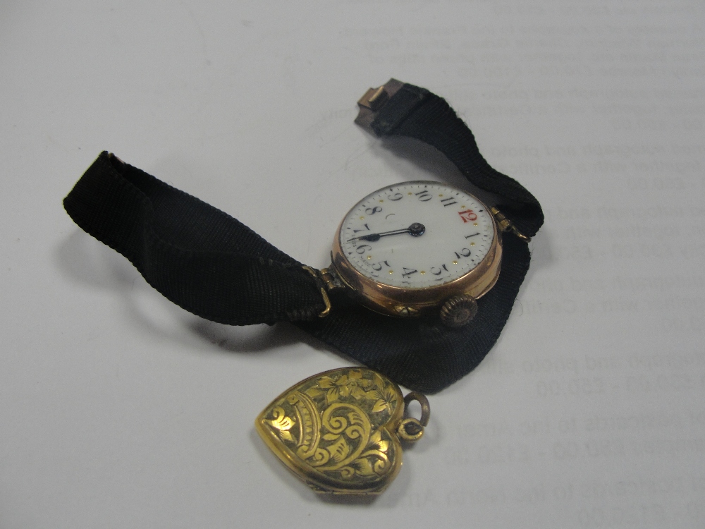 A 9ct ladies watch; together with a gold ring and locket