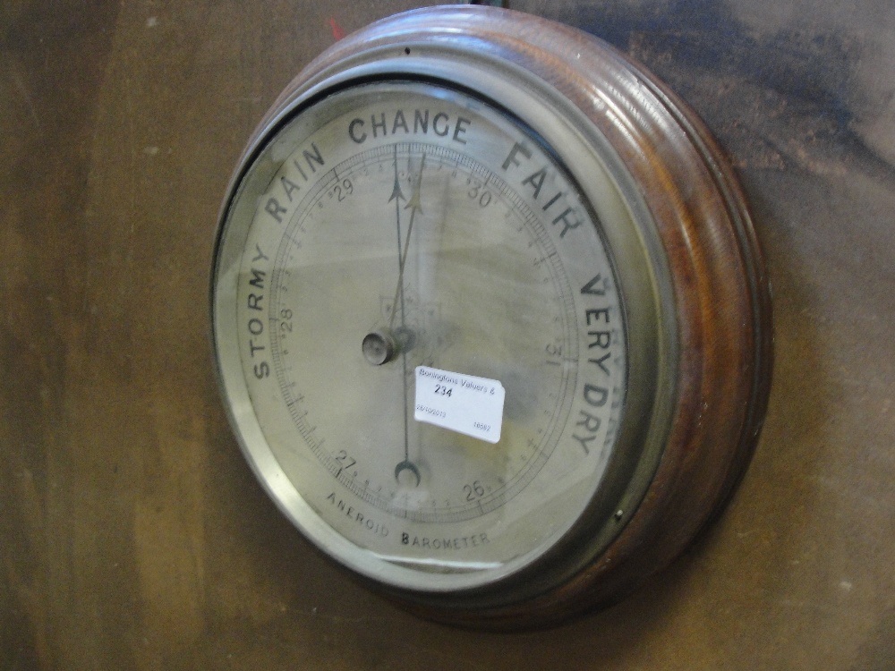 An oak 1920's aneroid barometer