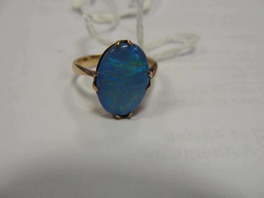 A 9ct black opal doublet ring