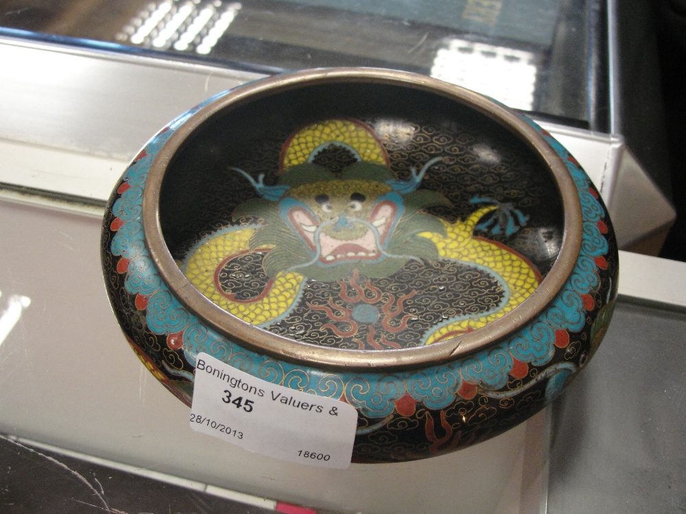 A 19th century cloisonne bowl with dragon decoration