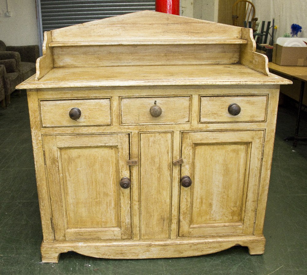 A Victorian painted pine dresser.