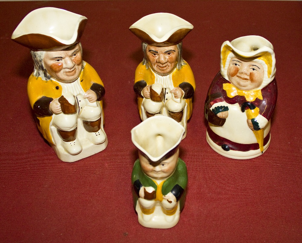 Four Tony Wood character jugs