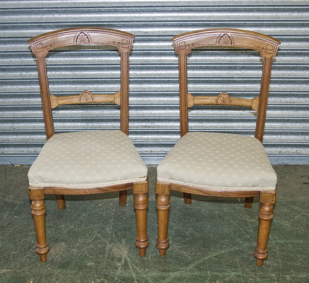 A pair of Victorian chairs.