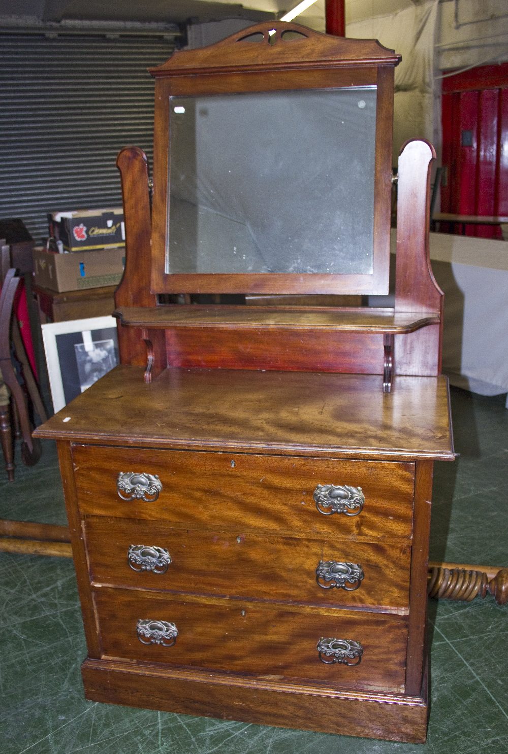An Edwardian dressing chest with mirror.